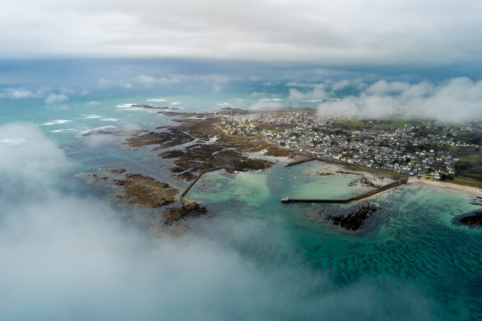 Aerial view of a coastal village and its surroundings